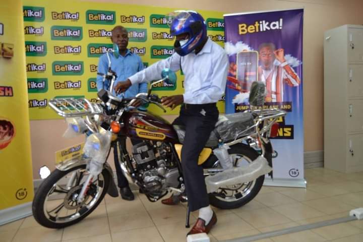 Man wins motorcycle in Kuboola Mtambo ndi Betika Aviator promo